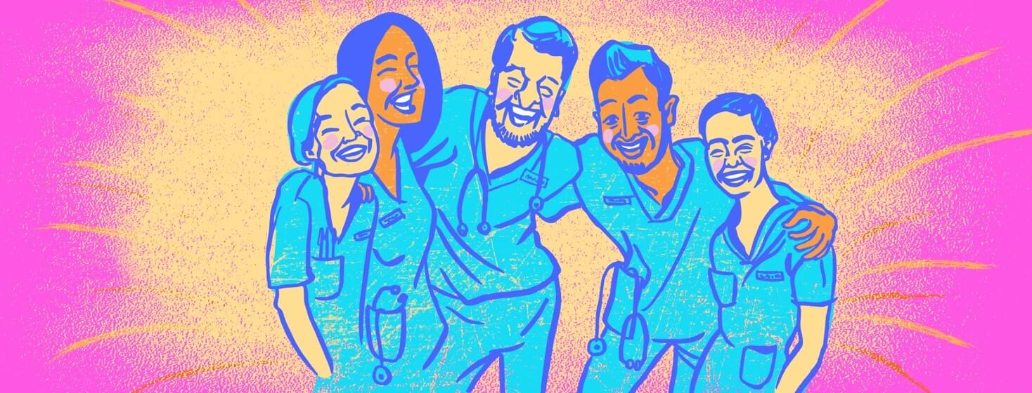 A group of doctors laughing directly at the camera