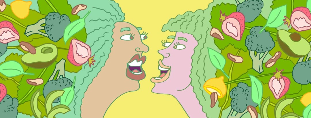 Two women looking at each other with hair being represented by salad containing the food elements as described in the article.