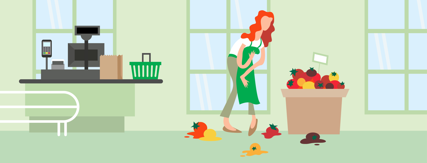 Grocer drops tomatoes and clutches her abdomen in pain while working.
