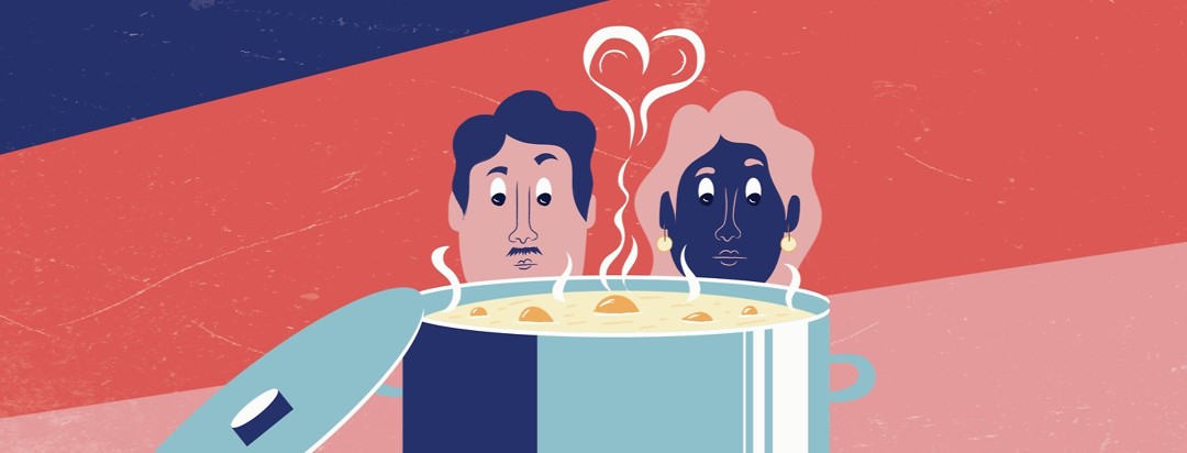 a man and woman looking into a bubbling pot of food with skeptical faces while steam rises above them creating a heart