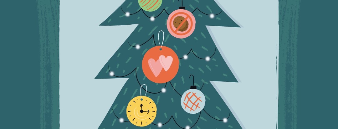 a Christmas tree decorated in ornaments showing a clock, two hearts, and no cookies