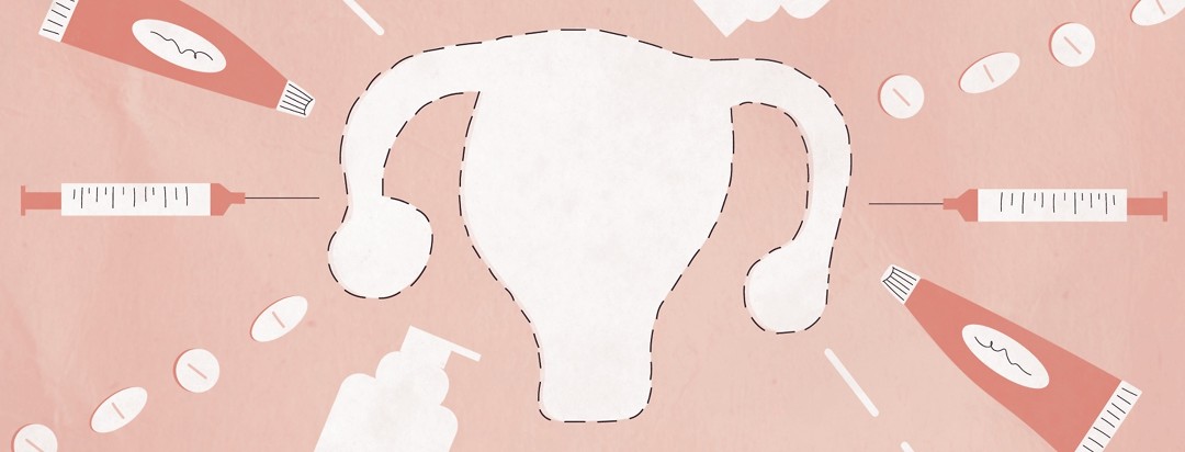 a uterus cut out of paper with forms of hormone replacement therapy surrounding it