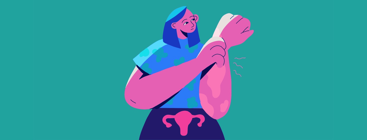 A woman with a uterus scratching her arm