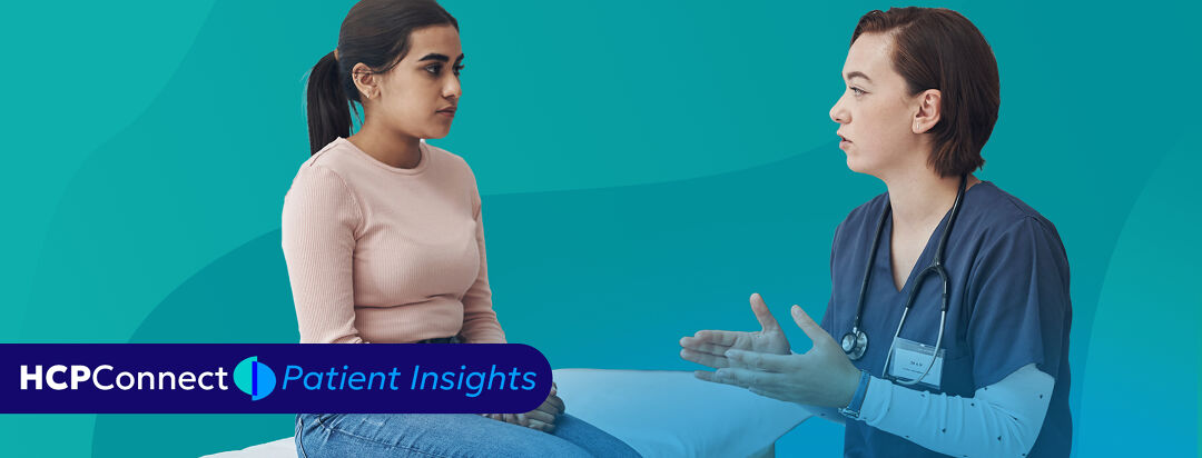 A female patient speaks with her doctor during an appointment